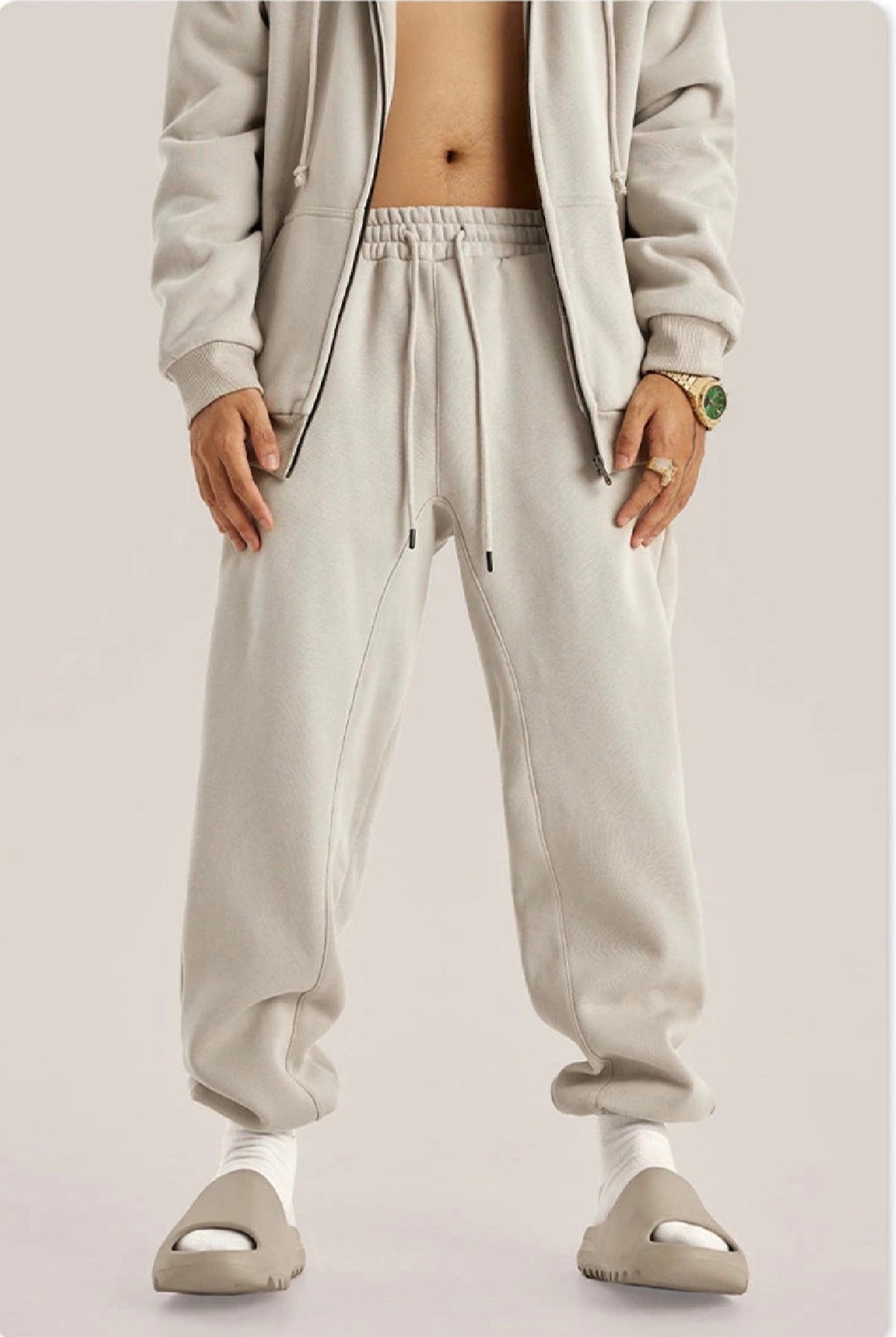 IVN Atelier solid color loose sweatpants in a relaxed fit, shown in a soft, comfortable fabric with an elastic waistband.