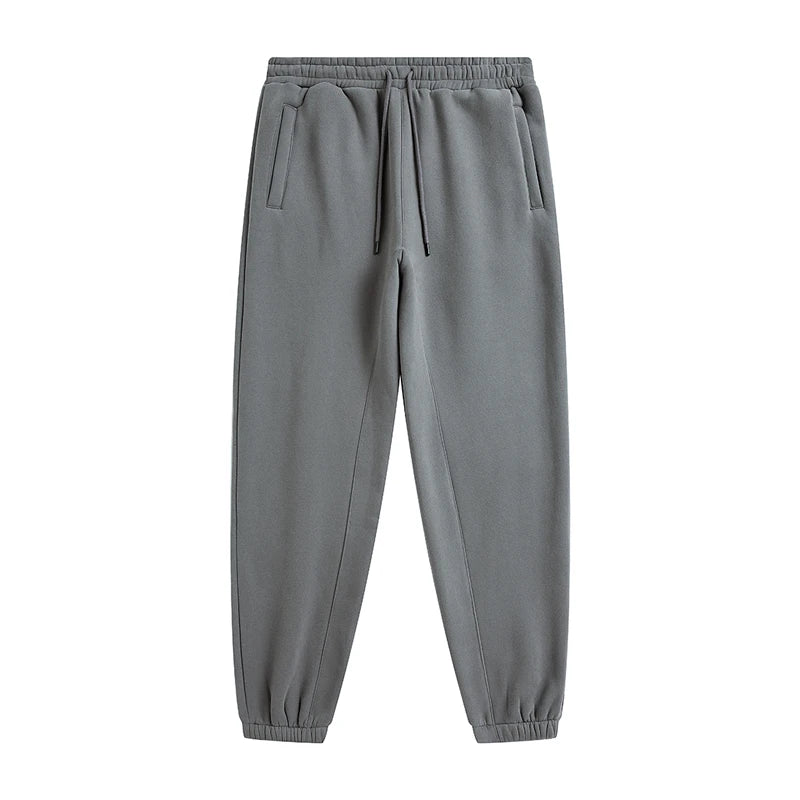 Solid color loose sweatpants from IVN Atelier, featuring a comfortable fit and casual style, shown in the product image.