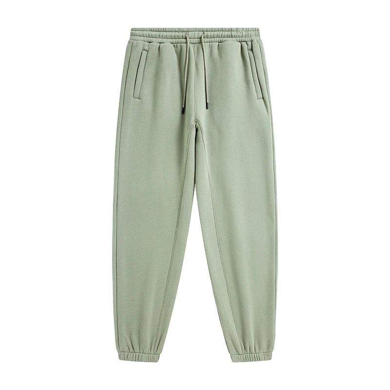 IVN Atelier solid color loose sweatpants shown on a model, featuring a relaxed fit and comfortable design.