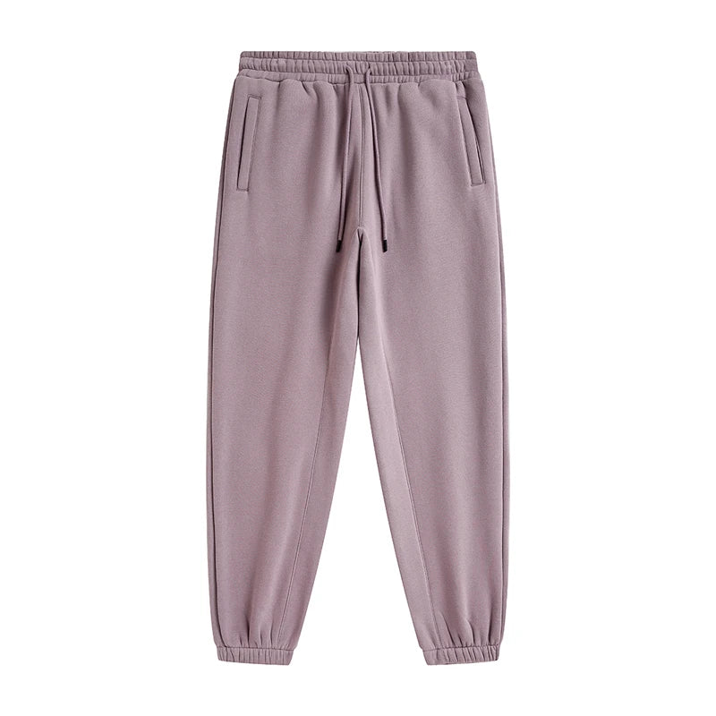 IVN Atelier solid color loose sweatpants shown with relaxed fit and soft fabric, perfect for comfortable casual wear.