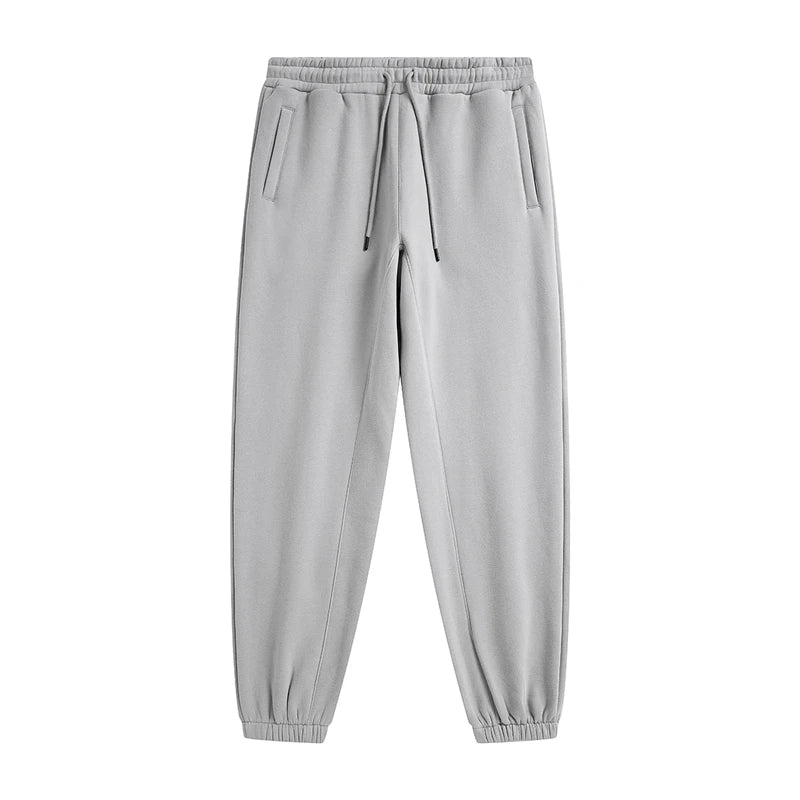 IVN Atelier solid color loose sweatpants shown with relaxed fit and soft fabric, ideal for casual or athletic wear.