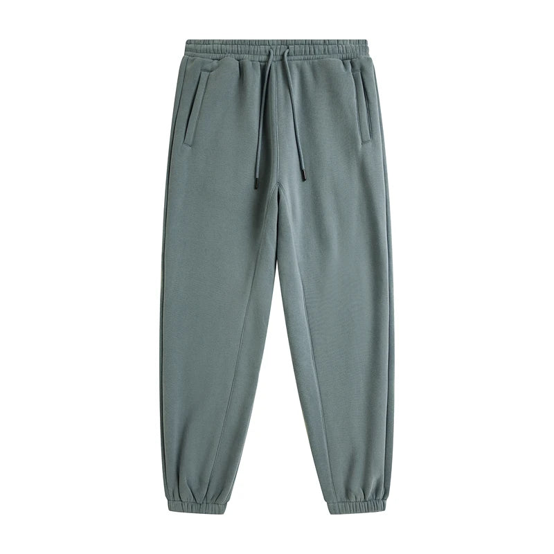 IVN Atelier solid color loose sweatpants displayed, featuring comfortable fit and soft fabric for casual wear.