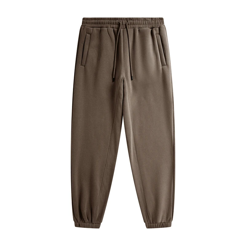 IVN Atelier solid color loose sweatpants displayed on a model, featuring a relaxed fit and comfortable style.