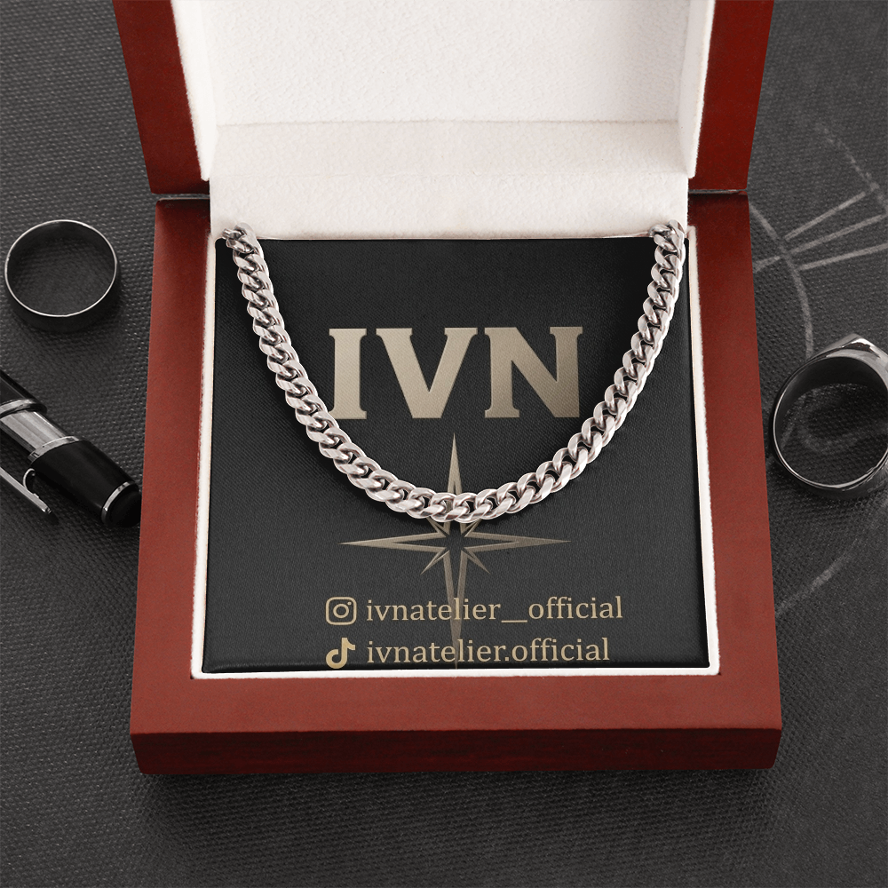 IVN Atelier Signature Cuban Link Jewelry showing a sleek, gold-tone chain with thick Cuban links on a neutral background.
