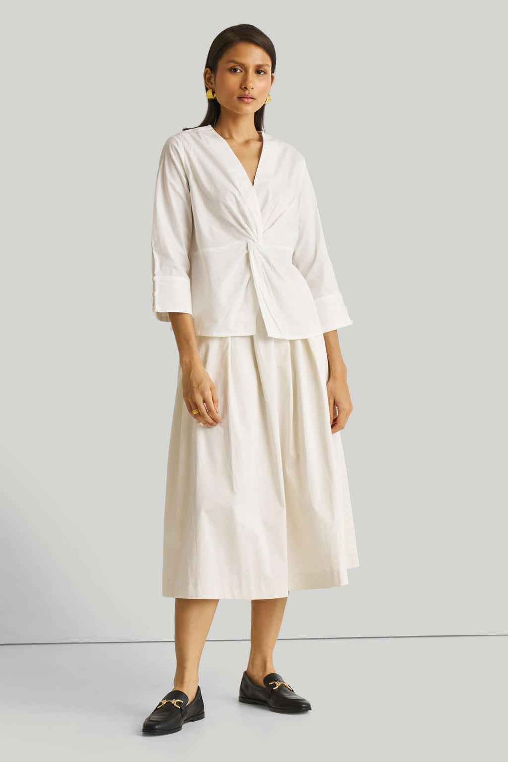 Top con giro frontal en blanco