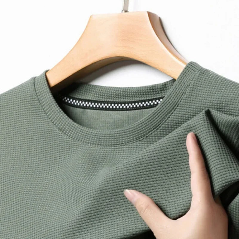 Nueva camiseta de manga corta y cuello redondo tipo gofre para hombre, ideal para el verano.
