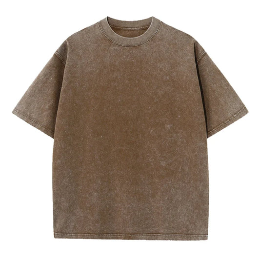 Vintage Washed Oversized T-shirt by IVN Atelier featuring a relaxed fit and faded fabric, displayed on a hanger.